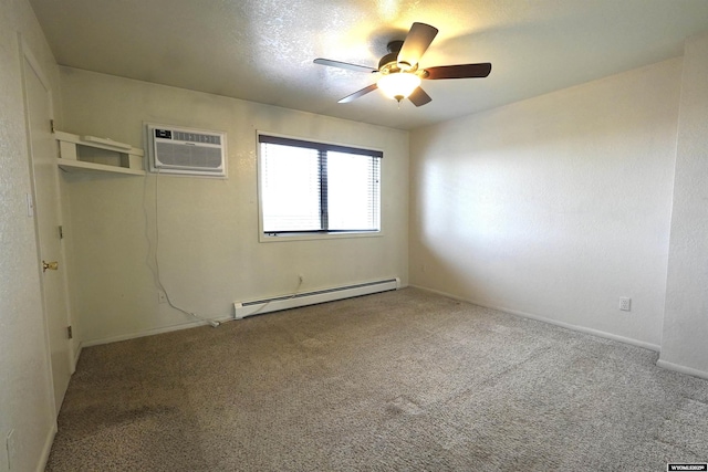 carpeted spare room with a wall unit AC, baseboards, a ceiling fan, and baseboard heating