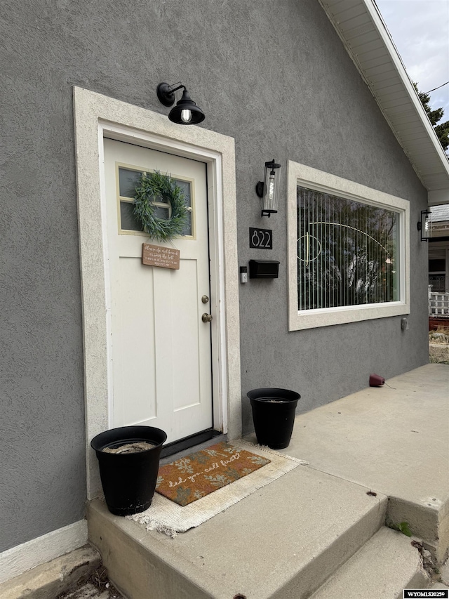 822 W St, Rock Springs, WY 82901 - view of exterior entry with stucco siding