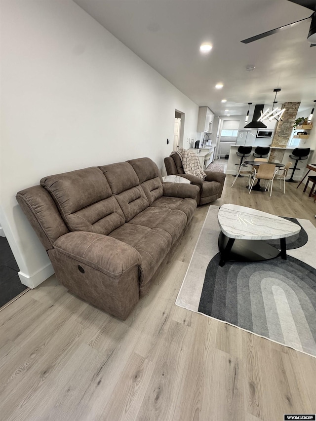 822 W St, Rock Springs, WY 82901 - living room with light wood-style flooring and recessed lighting