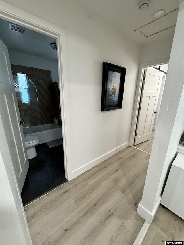822 W St, Rock Springs, WY 82901 - corridor featuring wood finished floors and baseboards