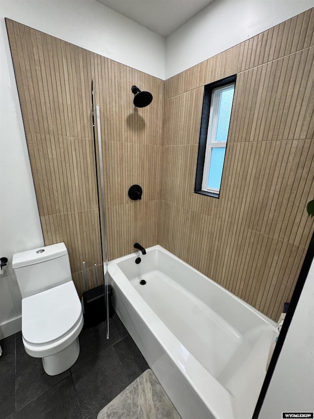 822 W St, Rock Springs, WY 82901 - full bathroom featuring toilet, tub / shower combination, and tile patterned flooring