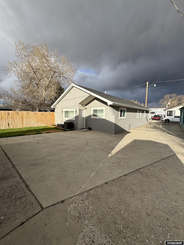 822 W St, Rock Springs, WY 82901 - view of side of property featuring fence