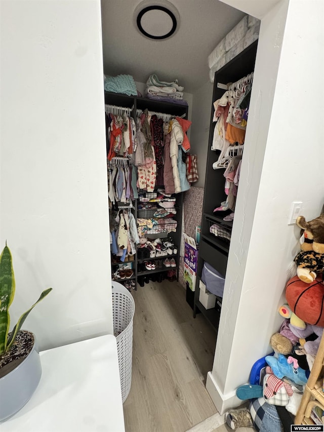 822 W St, Rock Springs, WY 82901 - walk in closet with wood finished floors