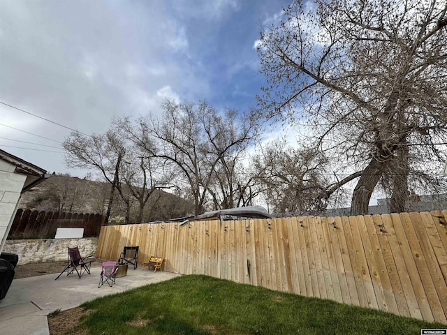 822 W St, Rock Springs, WY 82901 - view of yard with fence and a patio