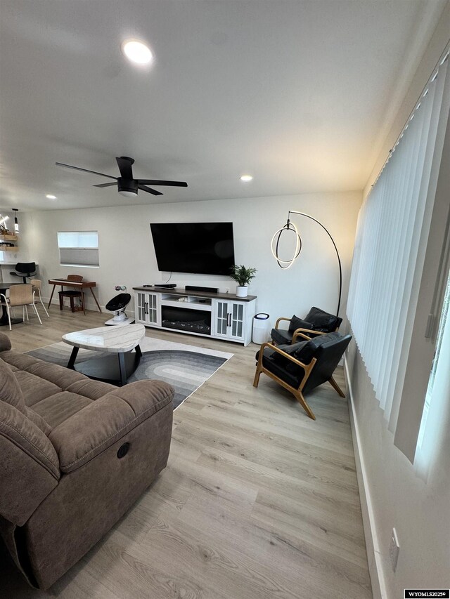 822 W St, Rock Springs, WY 82901 - living room featuring a ceiling fan, wood finished floors, and recessed lighting
