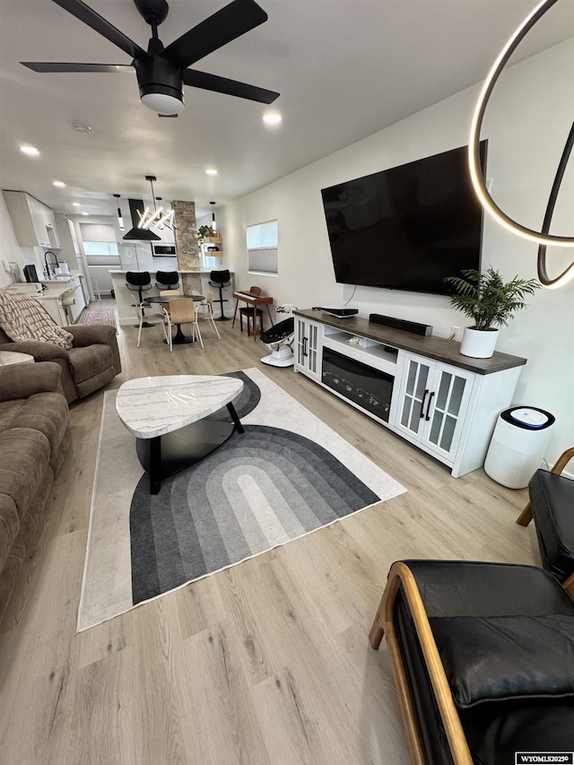 822 W St, Rock Springs, WY 82901 - living room with ceiling fan, wood finished floors, and recessed lighting