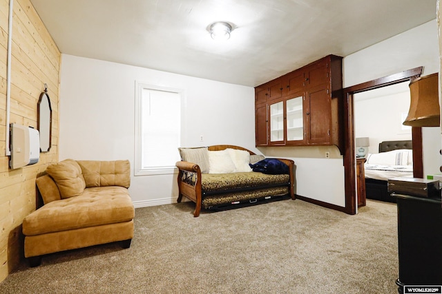 bedroom featuring baseboards and carpet flooring