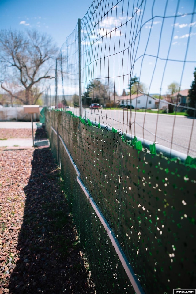 view of property's community with fence