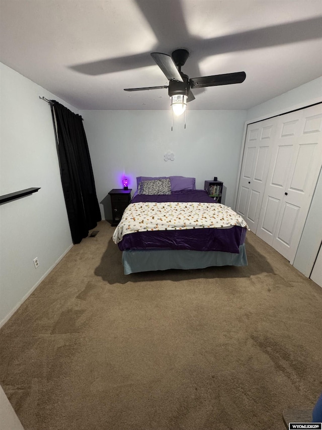 117 Sandstone Dr, Evanston, WY 82930 - bedroom featuring a closet, light carpet, and ceiling fan
