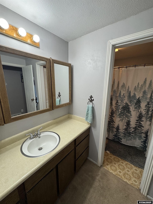 117 Sandstone Dr, Evanston, WY 82930 - full bath with vanity, a textured ceiling, and a shower with shower curtain