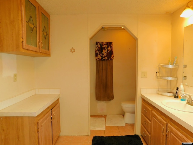 479 Hoskins Ln, Rock Springs, WY 82901 - bathroom with tile patterned flooring, toilet, and vanity