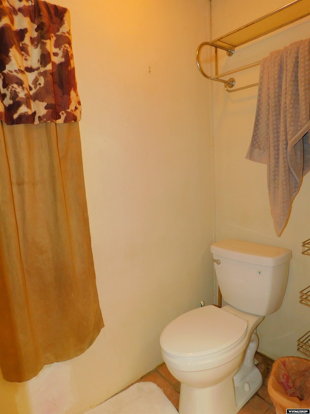 479 Hoskins Ln, Rock Springs, WY 82901 - bathroom with toilet and tile patterned flooring