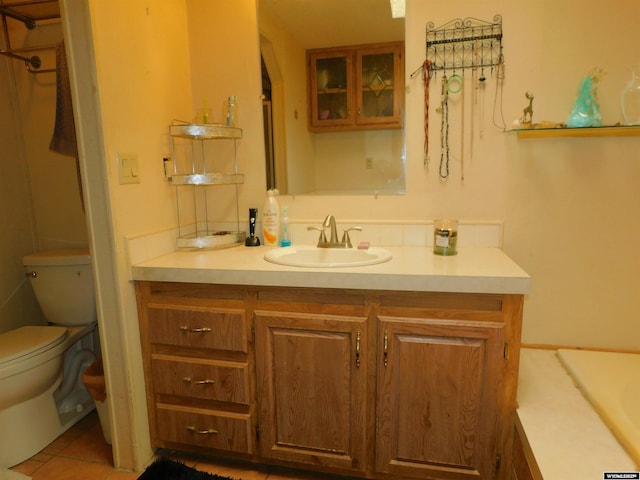 479 Hoskins Ln, Rock Springs, WY 82901 - full bathroom featuring tile patterned floors, toilet, and vanity