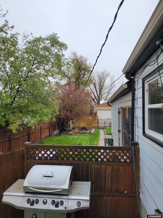 1001 Country Club Rd, Casper, WY 82609 - wooden terrace featuring a grill