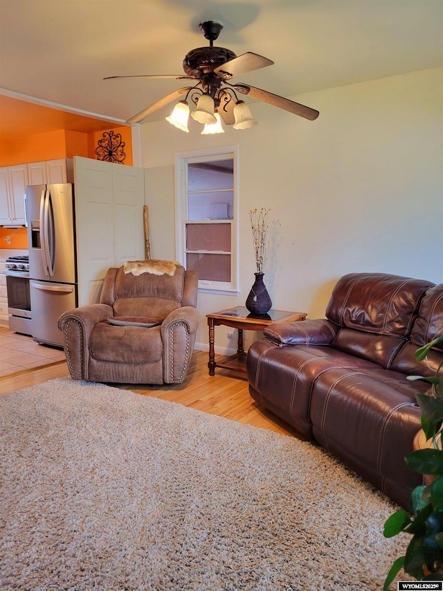 1001 Country Club Rd, Casper, WY 82609 - living room featuring a ceiling fan and light wood finished floors