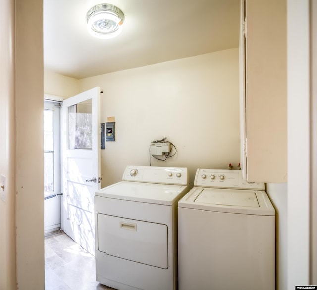 washroom featuring washer and clothes dryer