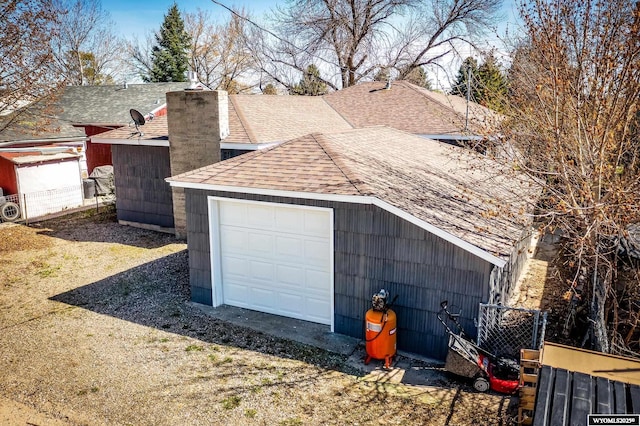 garage featuring fence