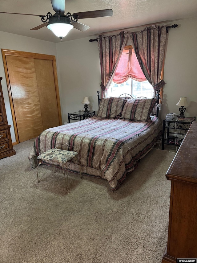 191 Lester Dr, Rock Springs, WY 82901 - carpeted bedroom with a closet and ceiling fan