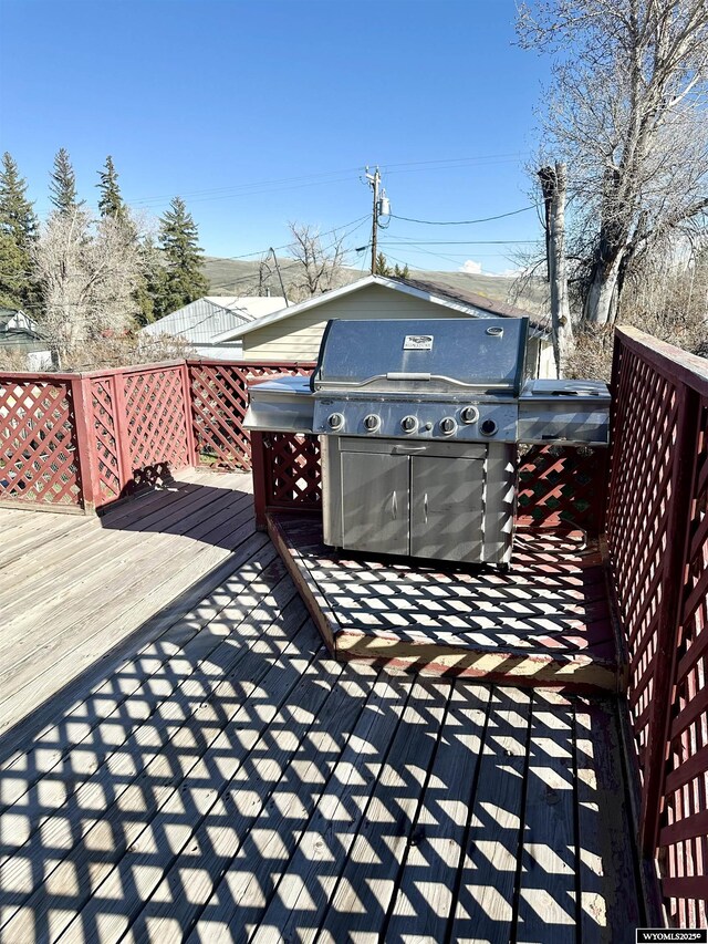 618 Emerald St, Kemmerer, WY 83101 - wooden terrace with grilling area