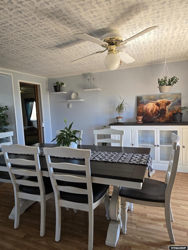 716 E 3rd St, Marbleton, WY 83113 - dining area with wood finished floors and ceiling fan