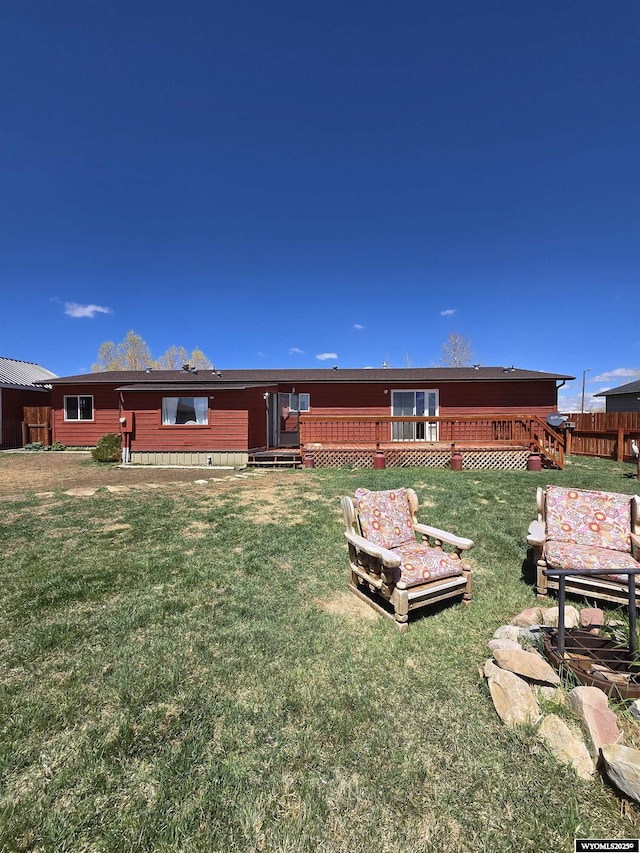 716 E 3rd St, Marbleton, WY 83113 - back of property with a wooden deck
