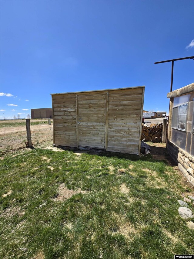 716 E 3rd St, Marbleton, WY 83113 - view of yard featuring an outbuilding and a storage shed