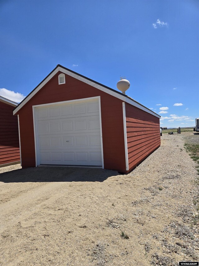 716 E 3rd St, Marbleton, WY 83113 - detached garage with dirt driveway