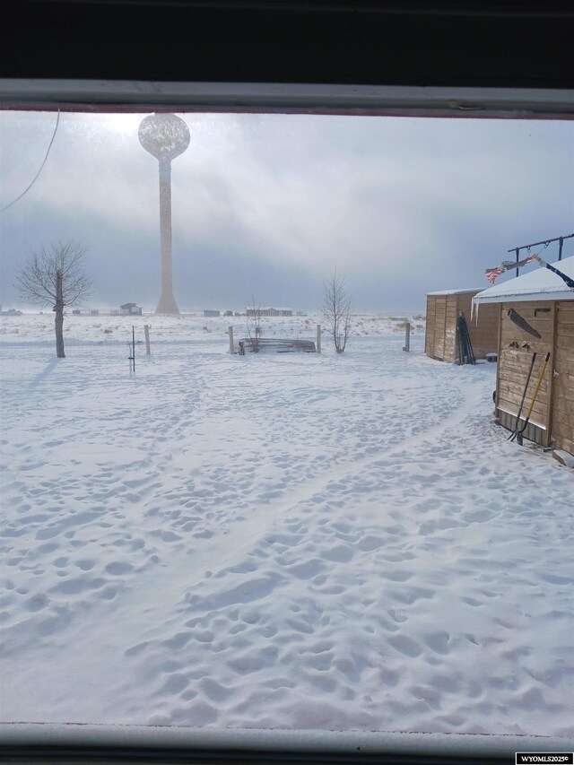 716 E 3rd St, Marbleton, WY 83113 - view of yard layered in snow