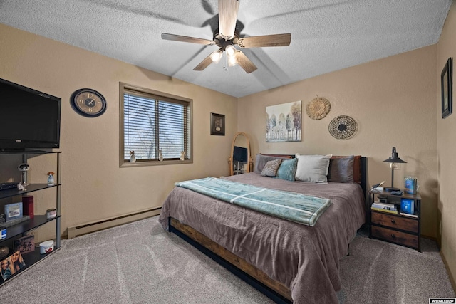 bedroom featuring a baseboard heating unit, carpet flooring, a textured ceiling, and ceiling fan