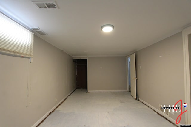 finished basement featuring baseboards