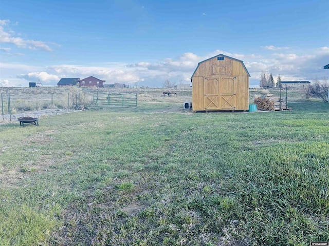 65 Eagle Ln, Lyman, WY 82937 - view of yard with a shed, an outbuilding, and a view of countryside