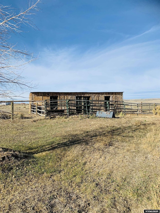 65 Eagle Ln, Lyman, WY 82937 - view of outbuilding with an outbuilding, a rural view, fence, and an exterior structure