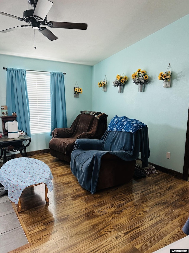 65 Eagle Ln, Lyman, WY 82937 - living area featuring a ceiling fan, wood finished floors, and baseboards