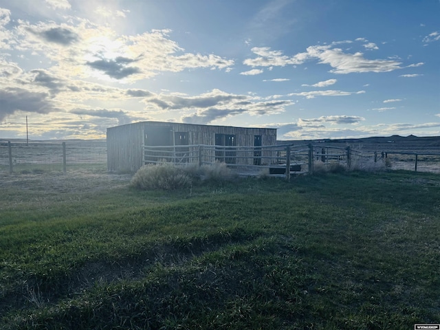 65 Eagle Ln, Lyman, WY 82937 - view of building exterior featuring fence and an outbuilding