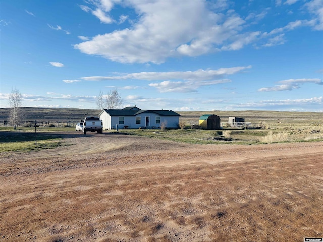 65 Eagle Ln, Lyman, WY 82937 - view of yard featuring dirt driveway and a view of countryside
