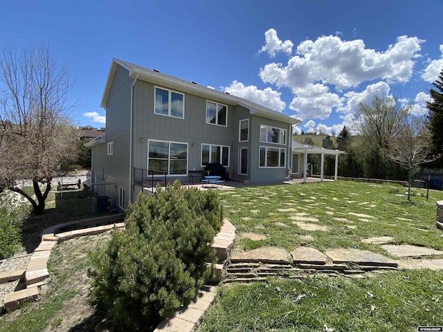 4230 S Oak St, Casper, WY 82601 - back of property with a patio area and a pergola