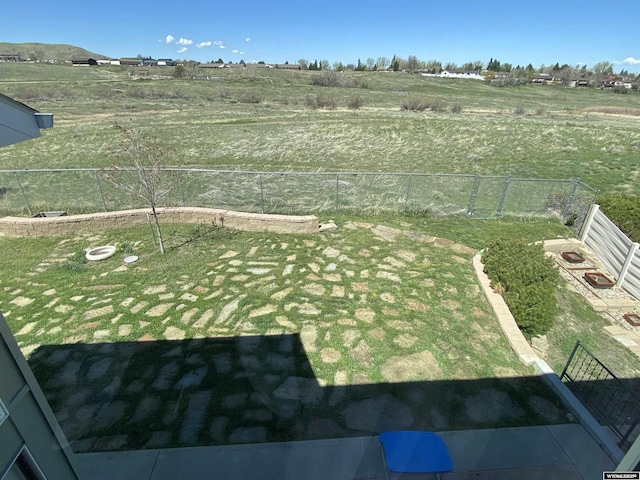 4230 S Oak St, Casper, WY 82601 - view of yard with fence and a view of countryside