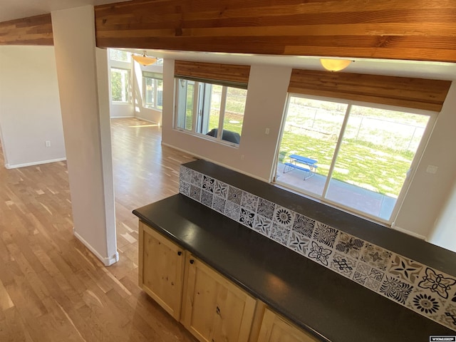 4230 S Oak St, Casper, WY 82601 - kitchen with dark countertops, light wood finished floors, and baseboards