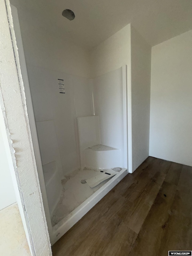4870 Buffalo Mdws, Way, Mills, WY 82604 - full bathroom featuring wood finished floors and a shower