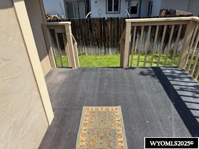 view of patio with fence