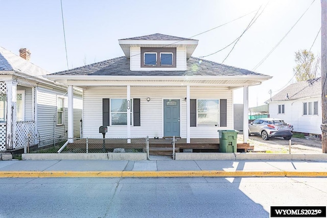 330 M St, Rock Springs, WY 82901 - view of front of home featuring a porch and roof with shingles
