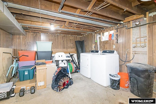 330 M St, Rock Springs, WY 82901 - unfinished basement featuring washing machine and clothes dryer and wood walls