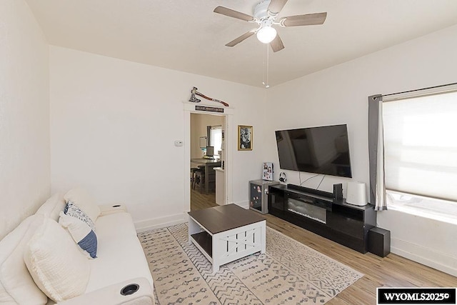 330 M St, Rock Springs, WY 82901 - living area with wood finished floors, ceiling fan, and baseboards