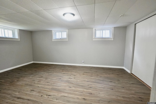 basement with wood finished floors and healthy amount of natural light