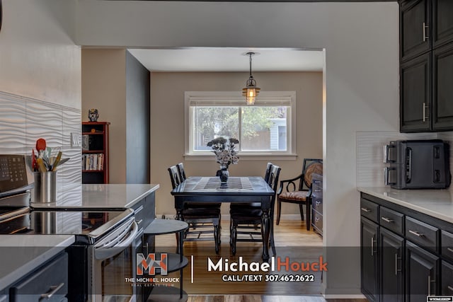 dining space with light wood-style floors