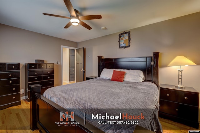 bedroom featuring wood finished floors and ceiling fan