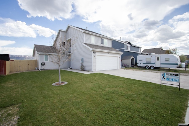 view of front of property with concrete driveway, a garage, and roof with shingles