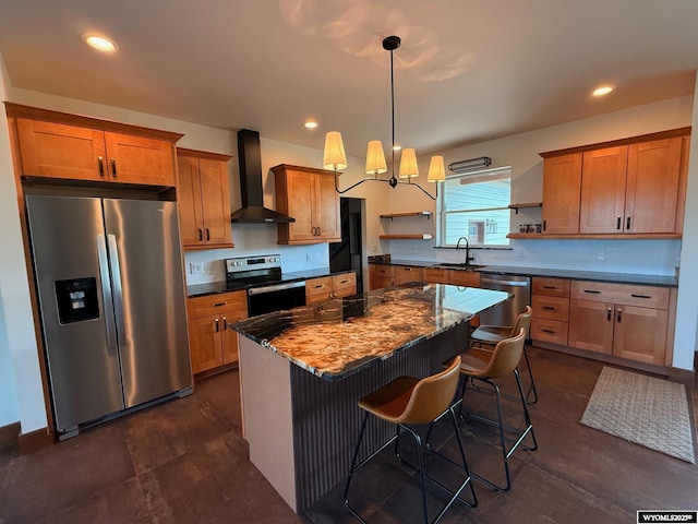 145 Cedar Lookout, Lander, WY 82520 - kitchen featuring appliances with stainless steel finishes, wall chimney range hood, open shelves, a sink, and a kitchen island