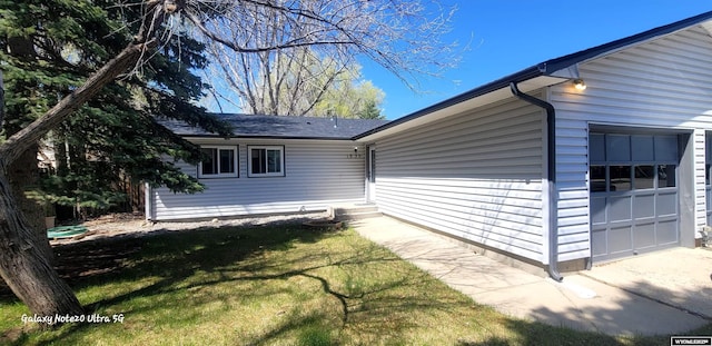 1630 De Smet Ave, Sheridan, WY 82801 - view of side of home with a yard and a garage