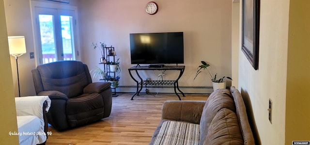 1630 De Smet Ave, Sheridan, WY 82801 - living room with light wood-type flooring, a baseboard heating unit, and baseboards